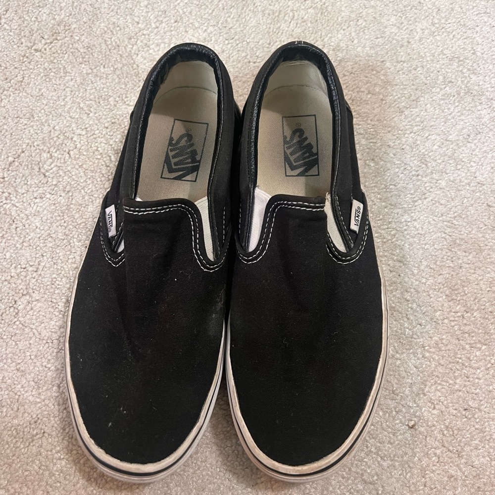 Vans Black Canvas Slip-Ons